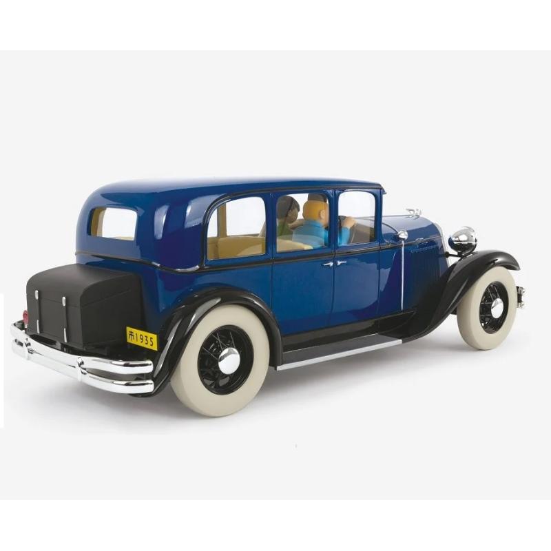 Tintin et Tchang dans la Chrysler du Lotus Bleu